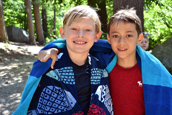 Boys smiling after playing on Lake Winnipesaukee Boys smiling after playing on Lake Winnipesaukee